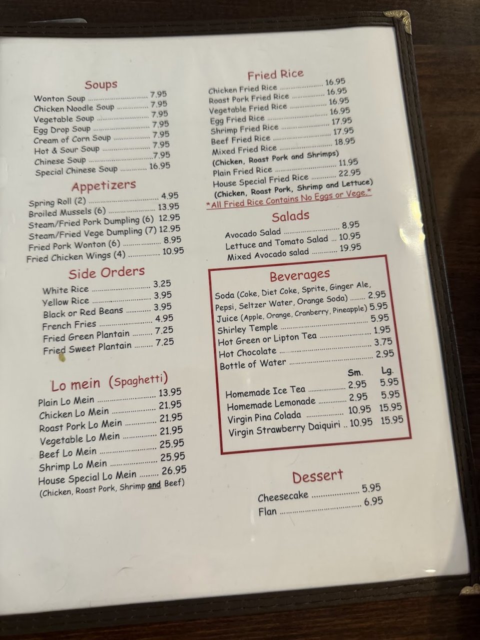 Printed menu showing chicken, pork, and shrimp dishes.
